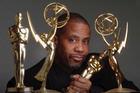 Russell Williams, artist in residence, holding his Oscar and Emmy awards