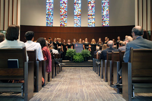 The Kay Center sanctuary with gospel choir at front and audience in pews