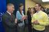 Photo: Eli Futerman, left, speaks with Blaze Cambruzzi, right, and other Kogod students.