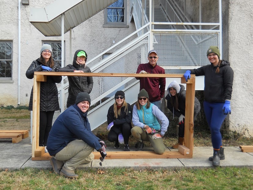 WCL students pose with planter