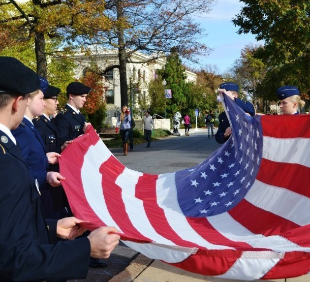 AU Students unfurl American Flag