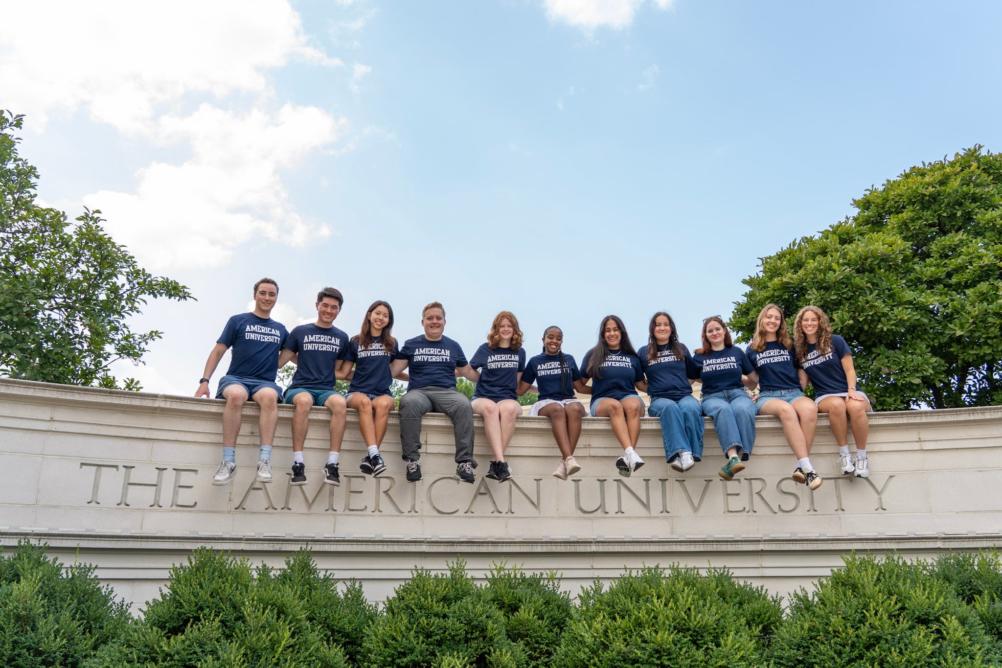 Students on AU Sign