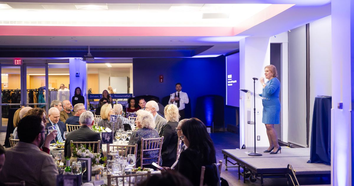 Patty Caballero speaking at AUAB Dinner
