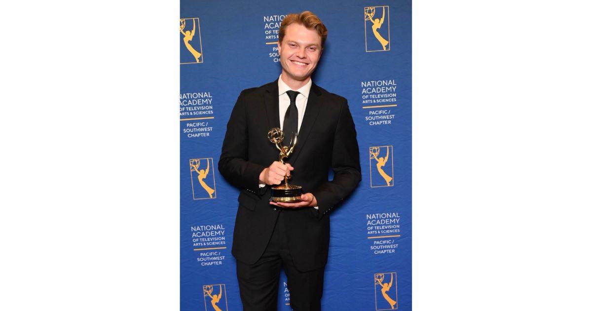 Jacob Clark with Emmy Award