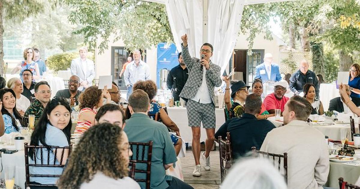 Toby McChesney leads a fundraiser at Airlie Brunch.