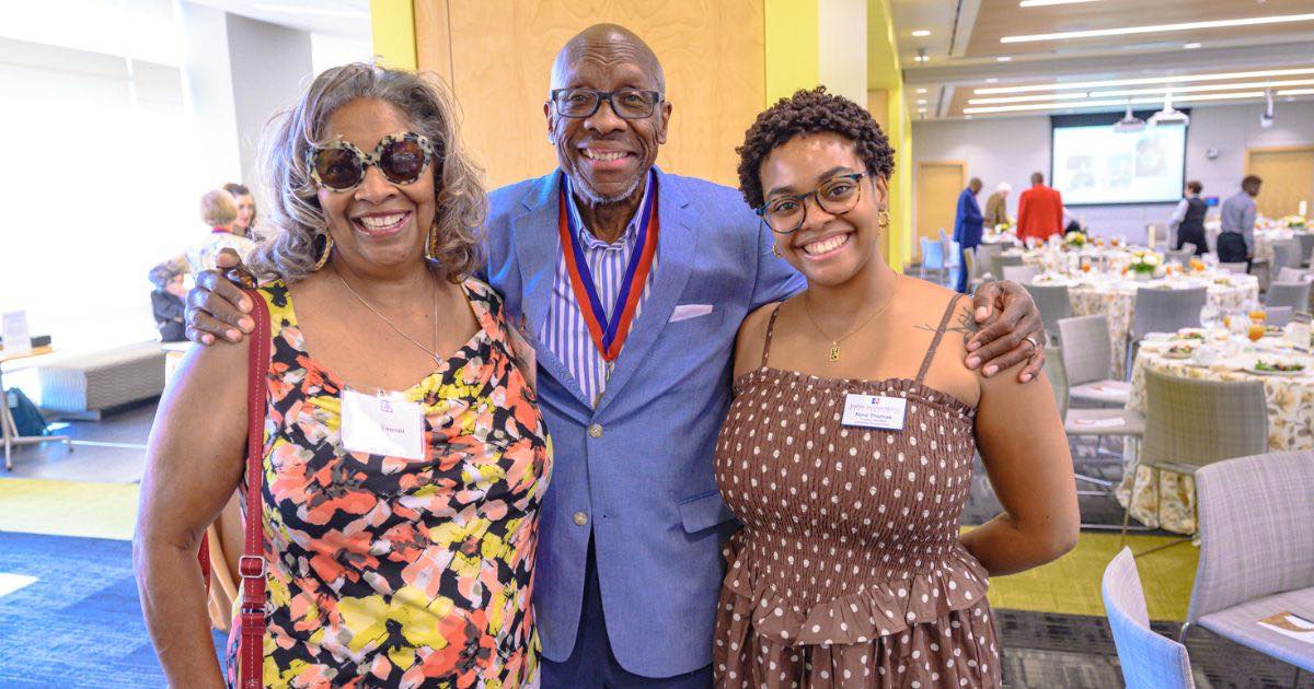 Judge Gerald Lee with his wife and AU staff member Judge Gerald Lee with his wife and AU staff member