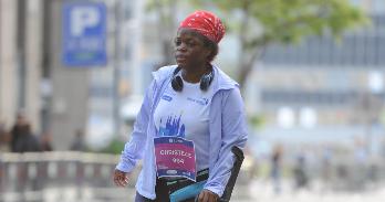AU alumna Christelle Nadia Fotso walking in the Barcelona Marathon