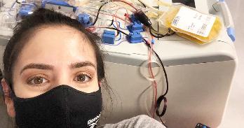 Melissa Sullivan takes a selfie while donating plasma.