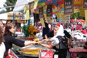 Paella for sale at an open air market.