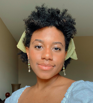 A woman smiling at the camera