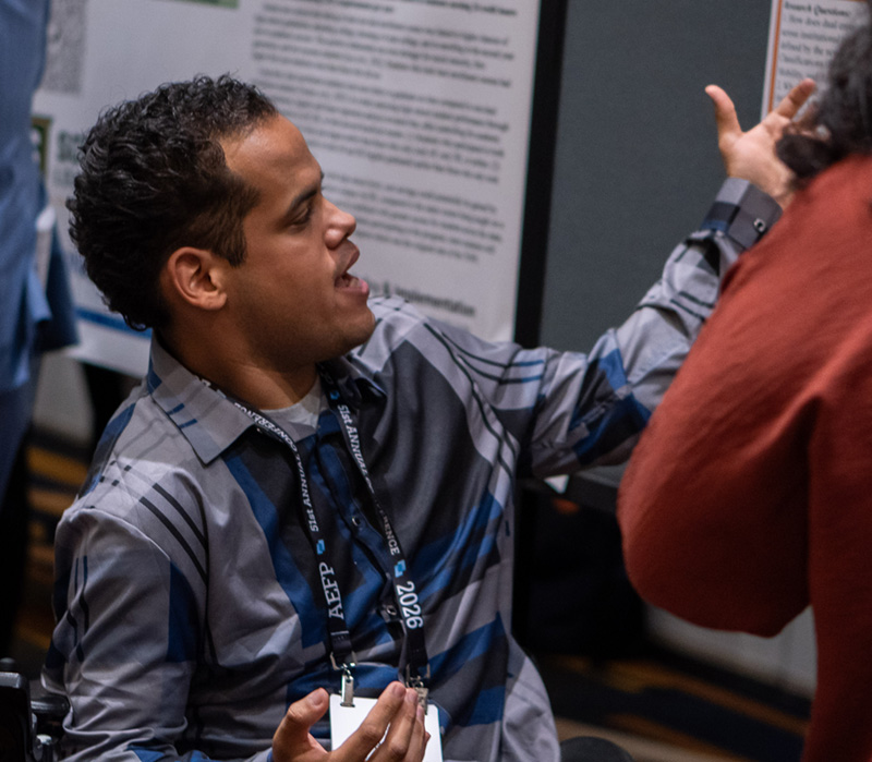 Carlos Gamez presenting at a conference.