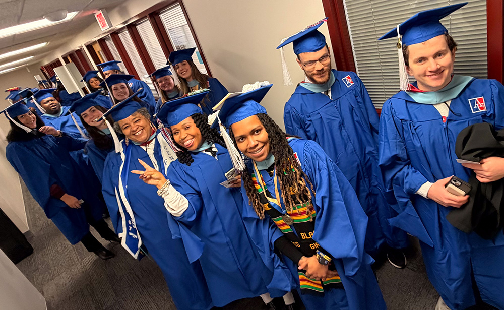 Fall 2025 graduates lined up to process Fall 2025 graduates lined up to process