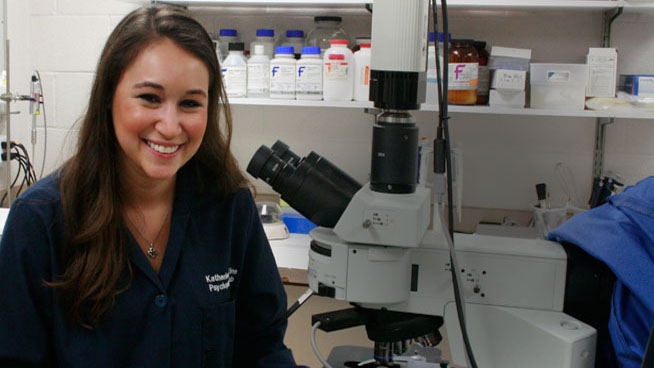 Student with microscope