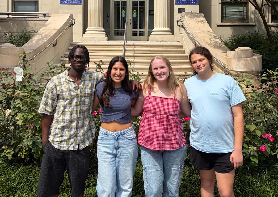 Frank Bannon, Evelyn Gutierrez, Lileia Olson, and Kai Feingold in front of Battelle-Tompkins building