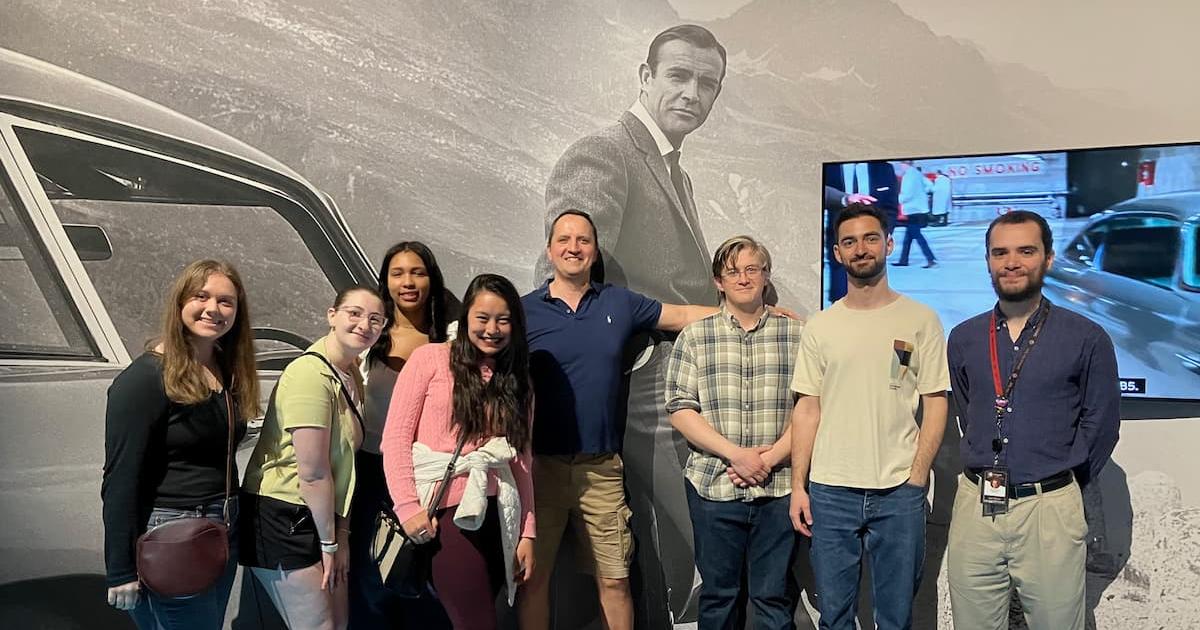 Student tour group at the International Spy Museum's Cold War artifacts.