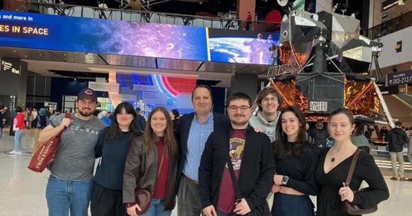 Tour group in the Destination Moon exhibit