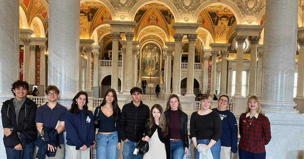 Students in the gorgeous Library of Congress.