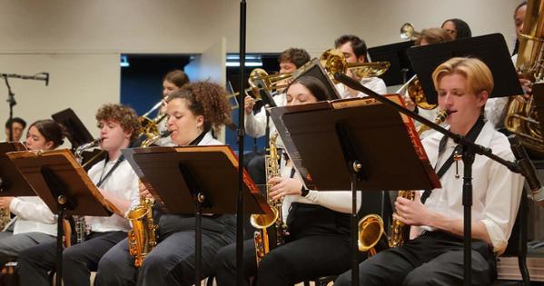 Brass section of AU band performs