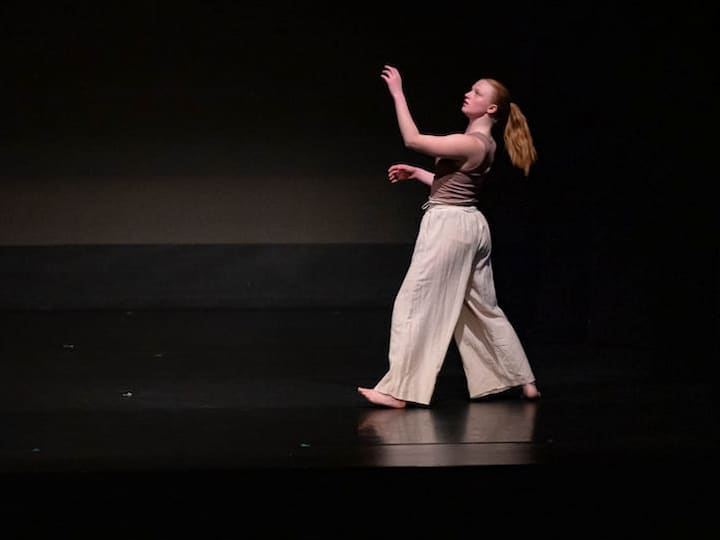 Kirschbaum performing in MO(ve)MENTUM 2022. Choreography: Allison Grant, "Centers of Gravity." Photography by Jeff Watts.