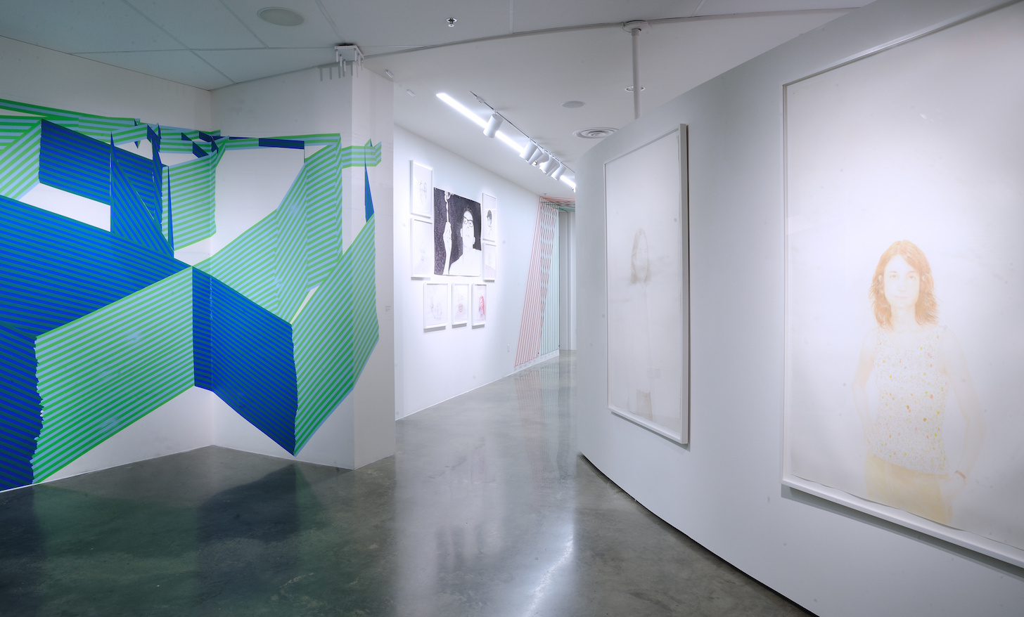Installation of multimedia exhibition with portraiture and tape