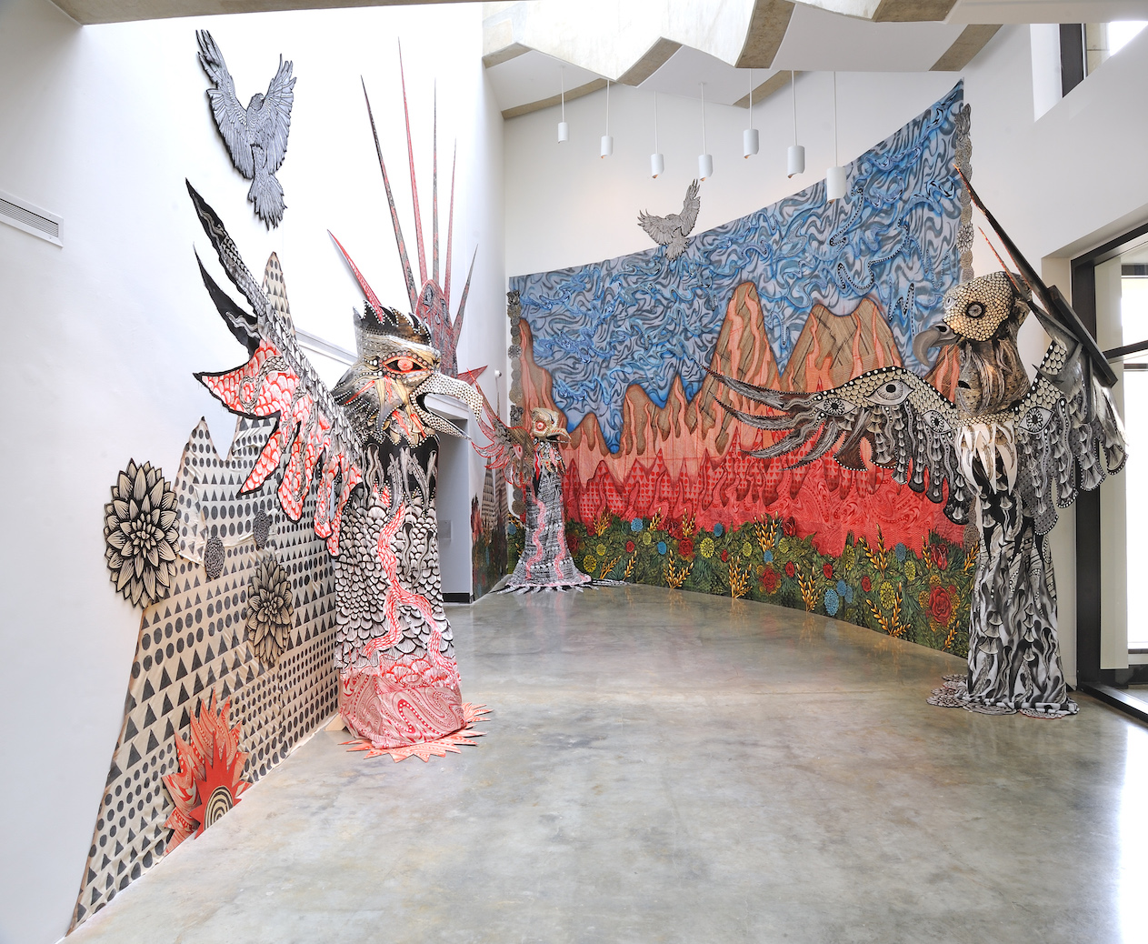 Installation view with screen-printed vultures and wall decoration