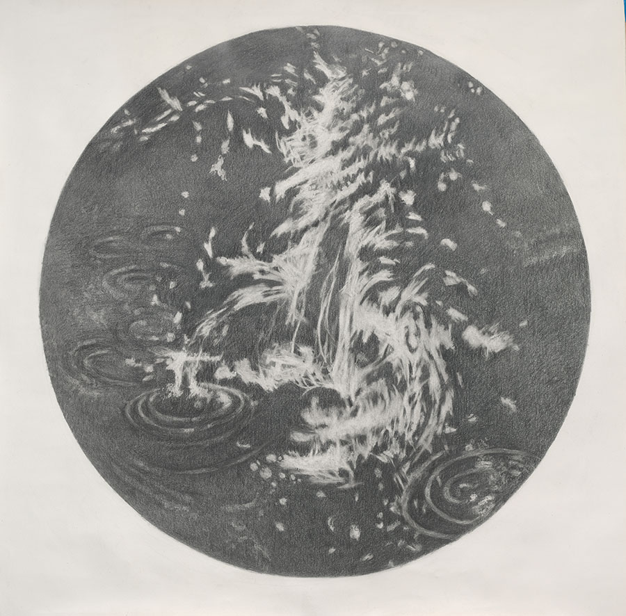 Circle of water with small splashes
