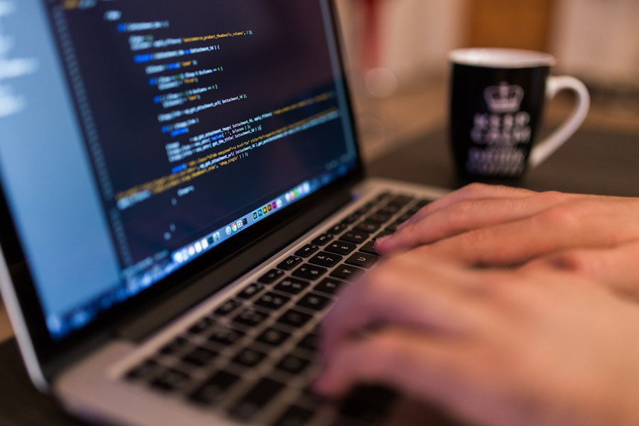 Hands typing code