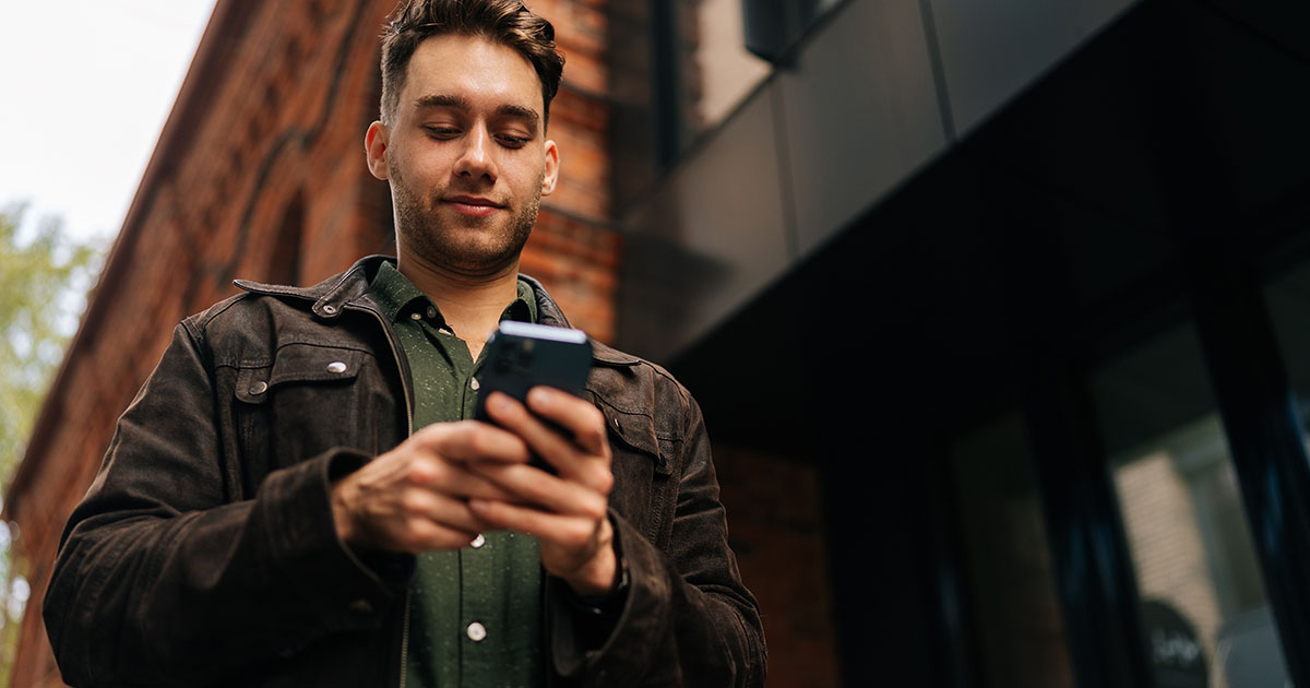 Man looking at cell phone