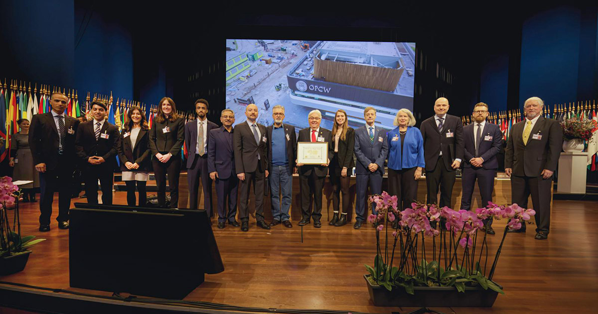 Conferral of the OPCW-The Hague Award to the CWC Coalition. Professor Costanzi is seventh from left