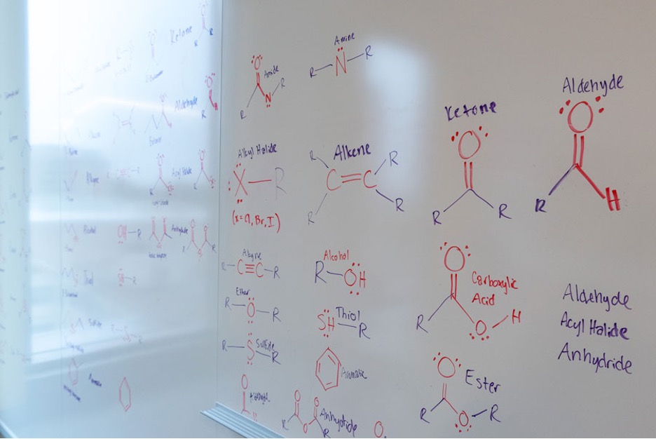 Chemistry equations on a whiteboard