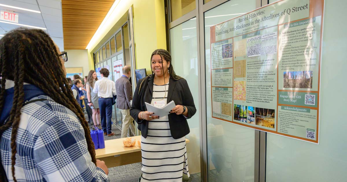 Katharine Grace McCartha presents her winning poster