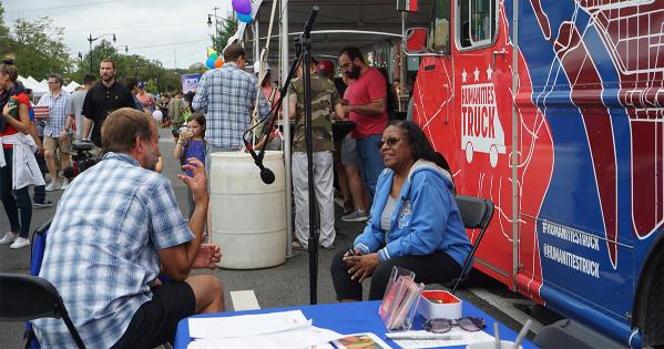 People talking with the AU Humanities Truck