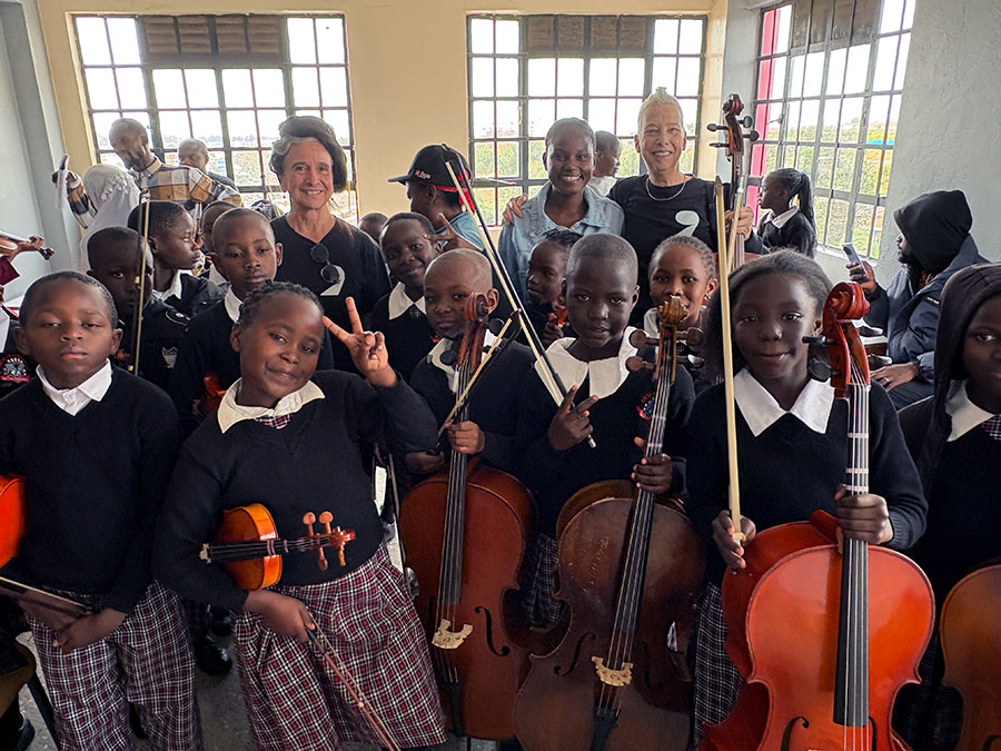  Nancy Jo Snider (back right) with S’Cool Sounds string students in Kibera, Kenya