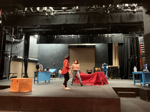 Students in motion as they rehearse the Sins of Sor Juana (credit Bret O'Brien)