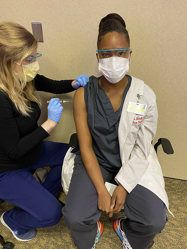 A person receiving the Covid-19 vaccine