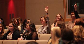 Audience member asks a question at a past conference.