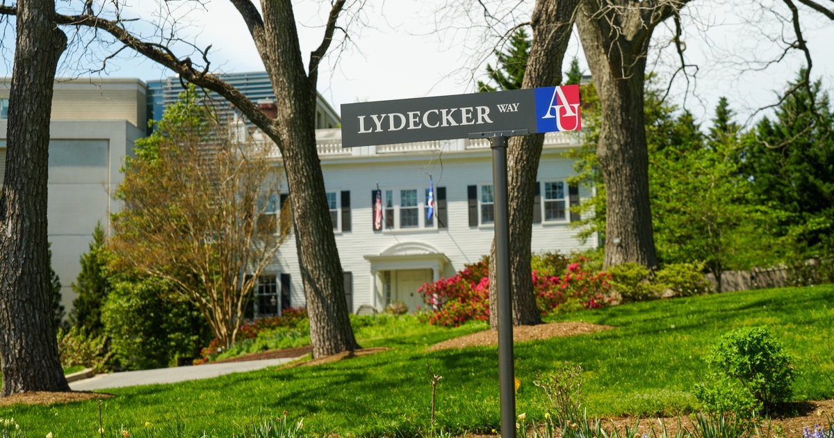 The signage for "Lydecker Way" in front of the President's House on AU's campus.