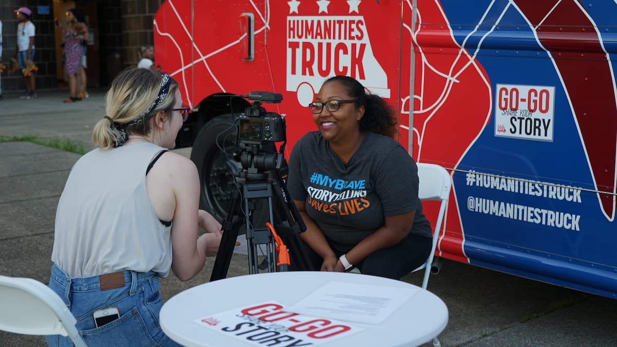 Humanities Truck Interview A woman is interviewed in front of the Humanities Truck