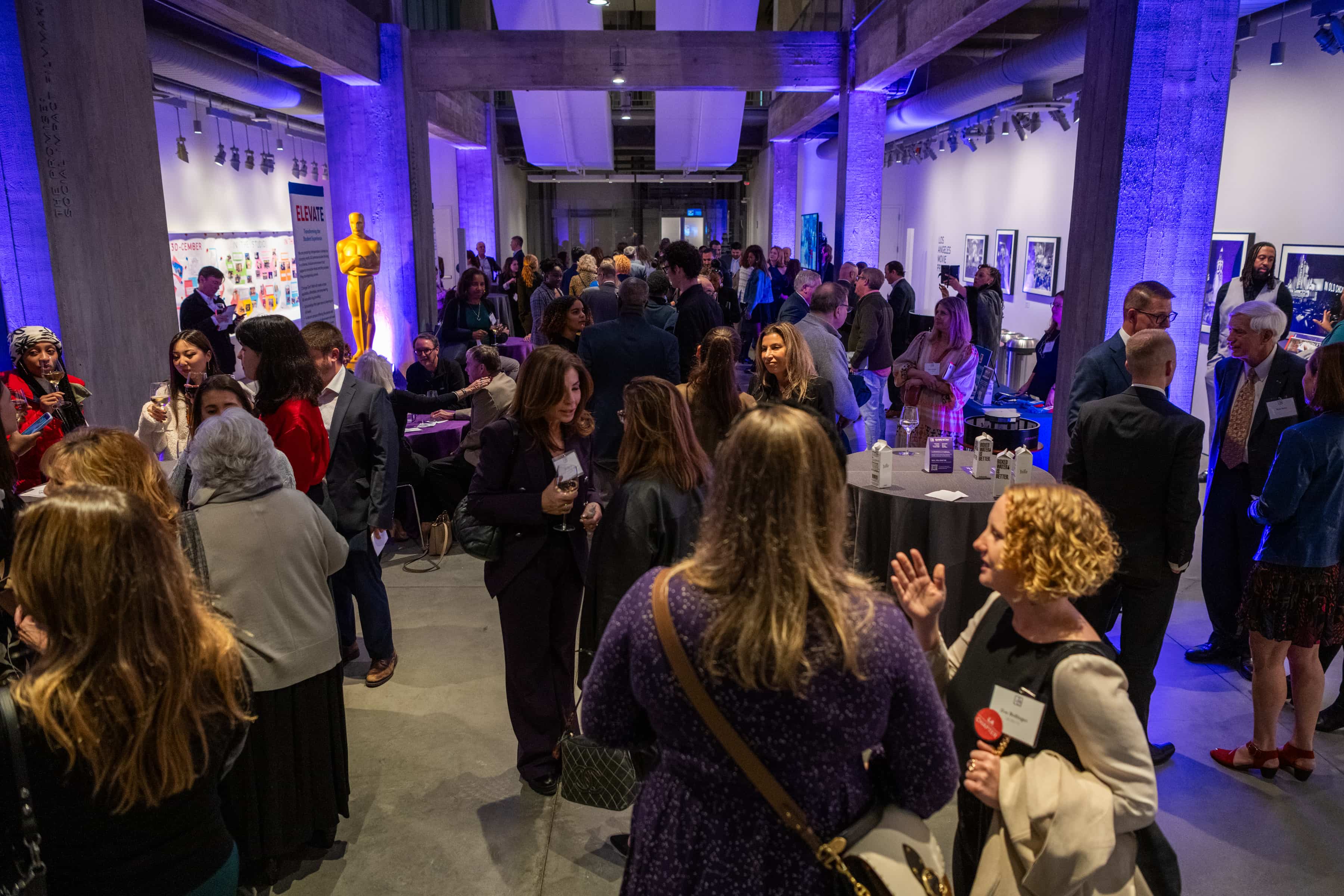 Guests gathering at a reception during the Change Can't Wait Los Angeles event.