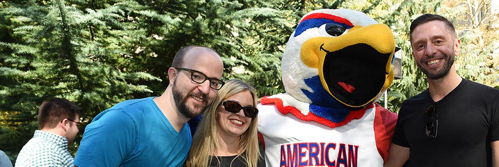 People standing with Clawed the Eagle