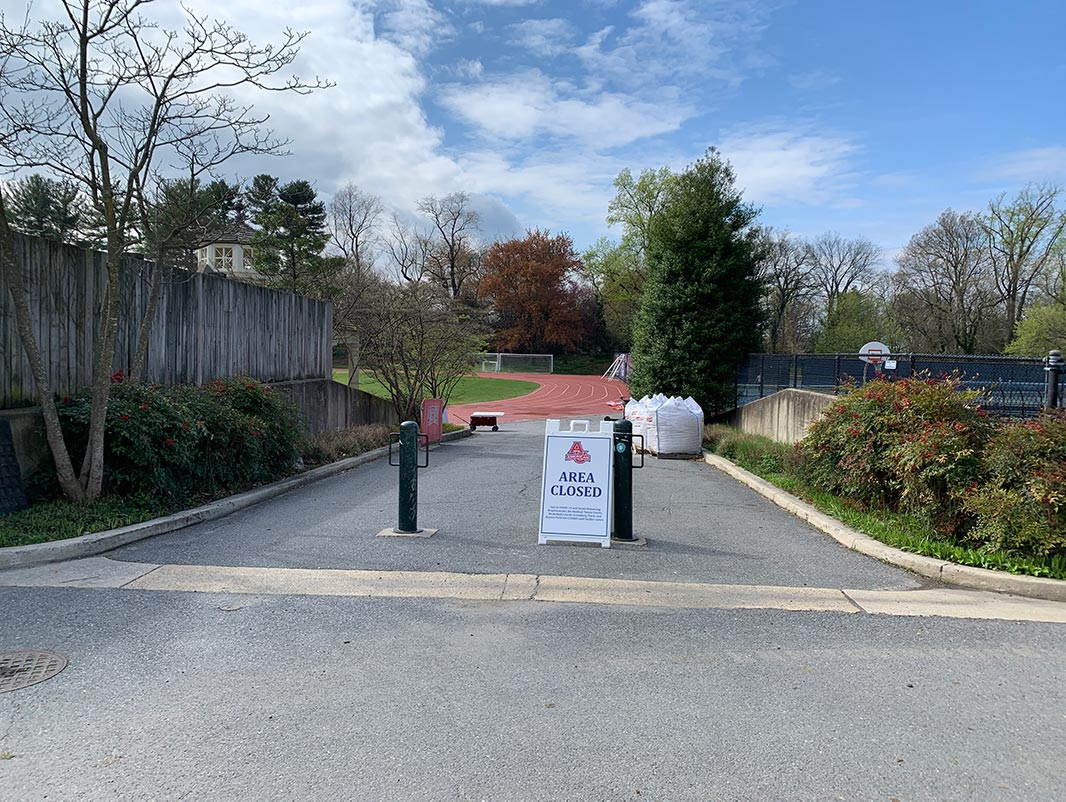 Closed sign at athletic track