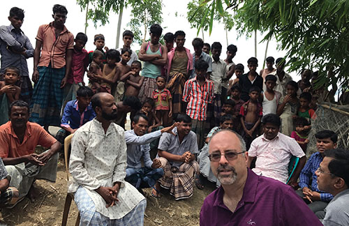Todd Eisenstadt with a group of people