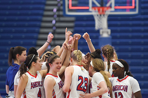 The AU women’s basketball team huddles before the Patriot League quarterfinal against Lafayette.