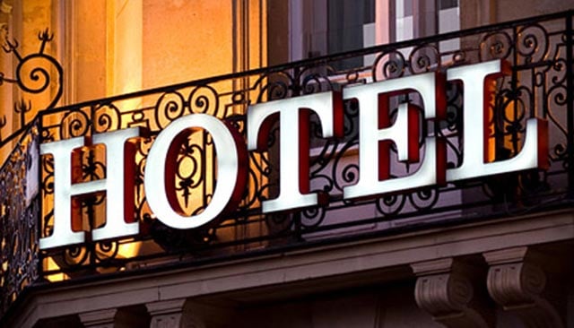 Balcony with a sign reading "Hotel"
