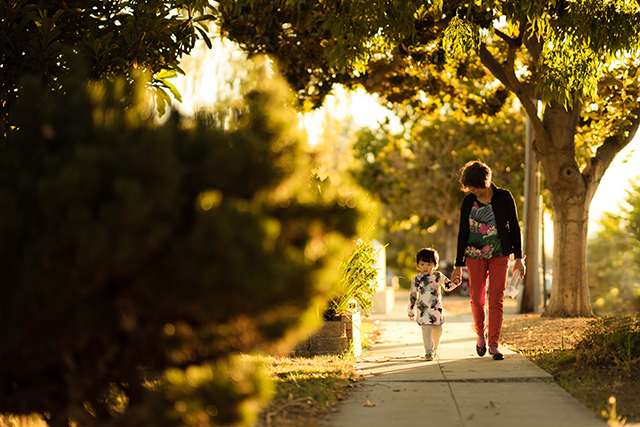mother and child walking outside