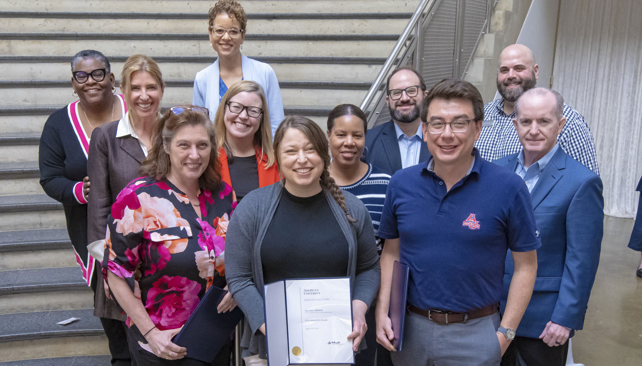 2023 Collaboration Award winners Karyn Cassella, Amanda Dowd, Jimmy Ellis, and members of the American University President's Cabinet.