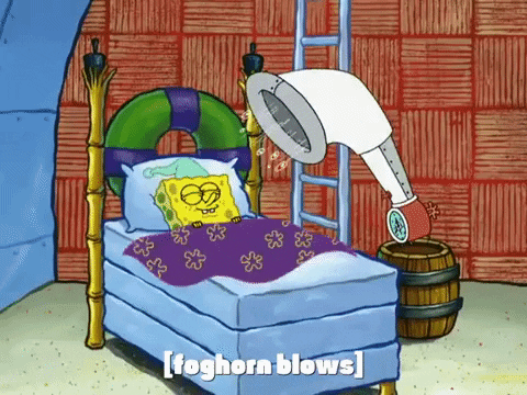 Spongebob being woken up by a loud alarm clock. 