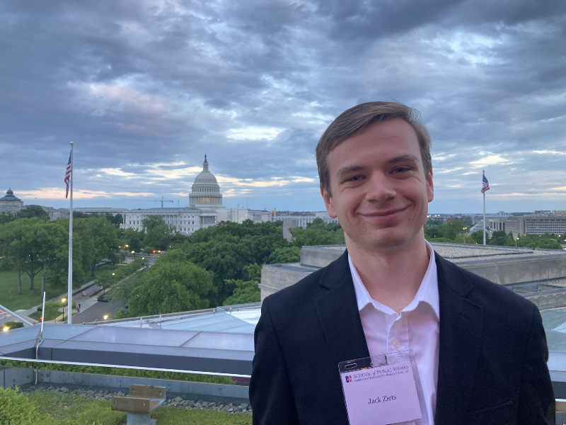 photo of Jack in a blazer in front of the US capitol building