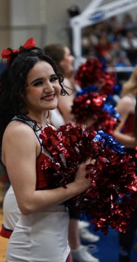 Student in cheer outfit
