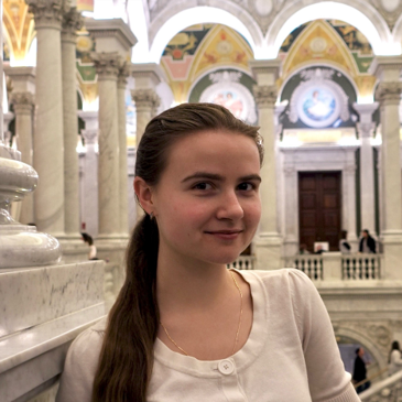 Woman posing in the Library of Congress